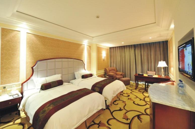 Hotel Pacific Grand Ningbo Zimmer foto